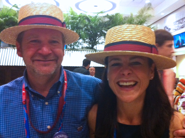 Jane Timken and her husband Ward J. “Tim” Timken Jr. wearing boater hats and smiling